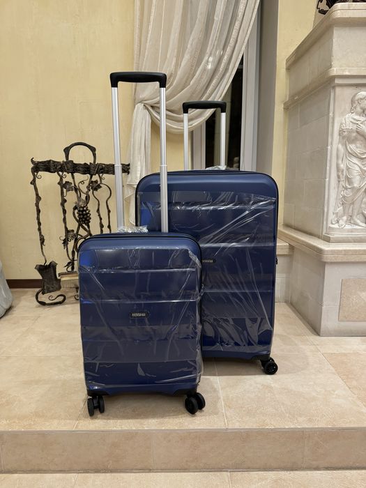 American tourister новый чемодан маленький и большой
