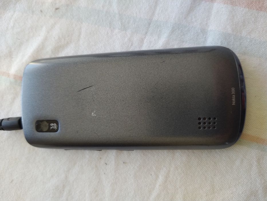 Nokia Asha 300 in Working Condition64170809902465122