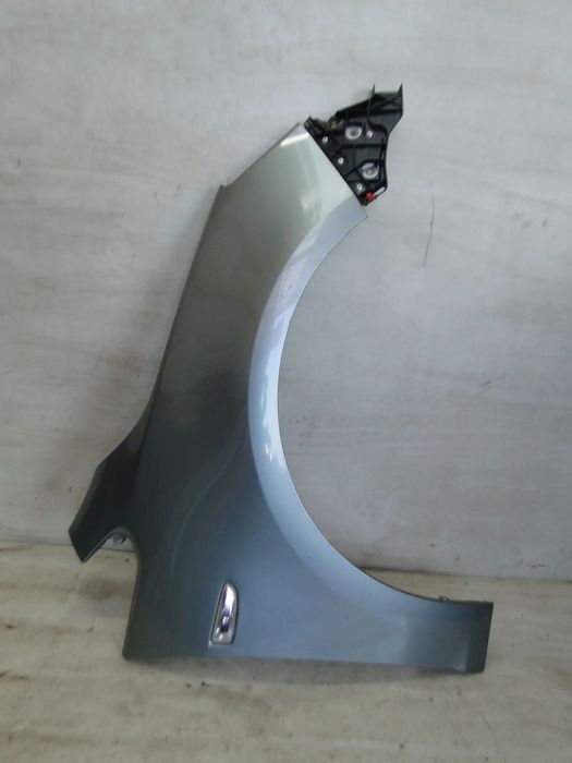 OPEL ASTRA IV J BŁOTNIK PRAWY PRZÓD PRZEDNI Z179