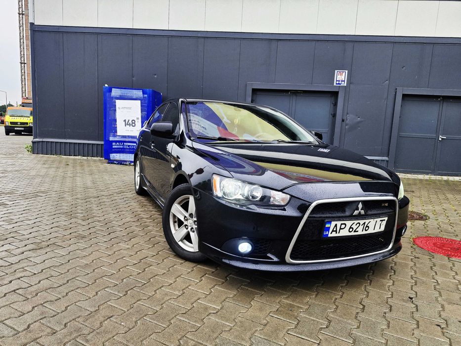 Митсубиши Лансер Х