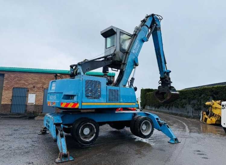 Екскаватор для перевалки лісу , металолома FUCHS MHL 320