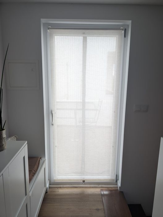 Estore de correr em rolo bege