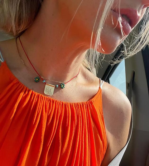 GUSH підвіс на червоній нитці Тризуб