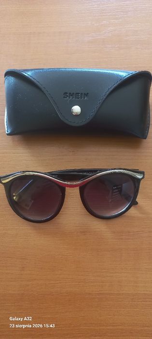 Okulary przeciwsłoneczne Lagofree W7027 retro okrągłe czarne oraz czarne etui