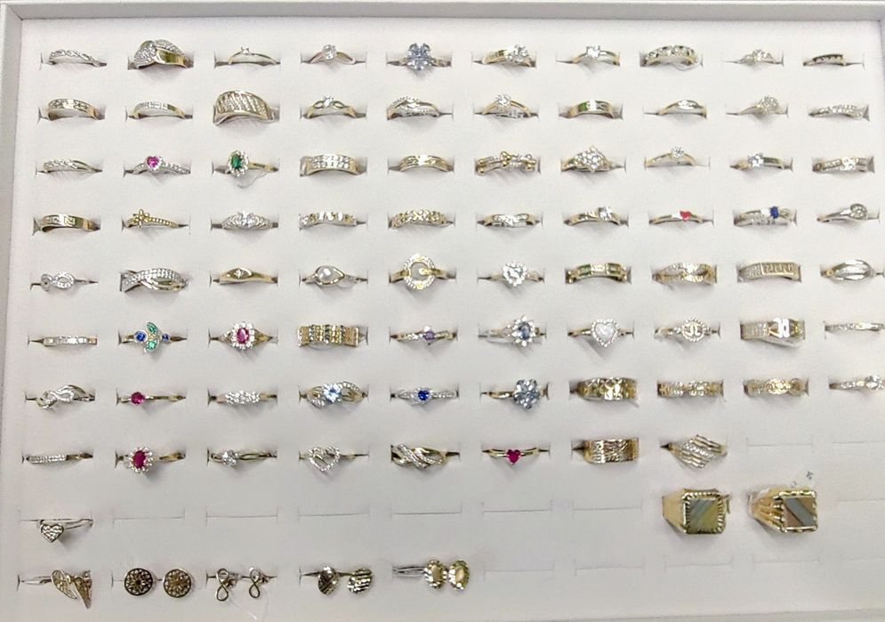 Złoty pierścionek z sercem zdobionym cyrkoniami PR 585