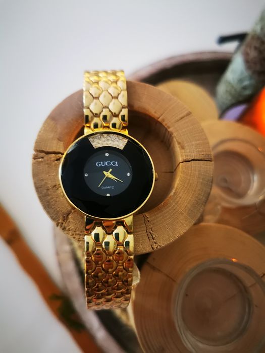 Zegarek złota bransoleta Gucci