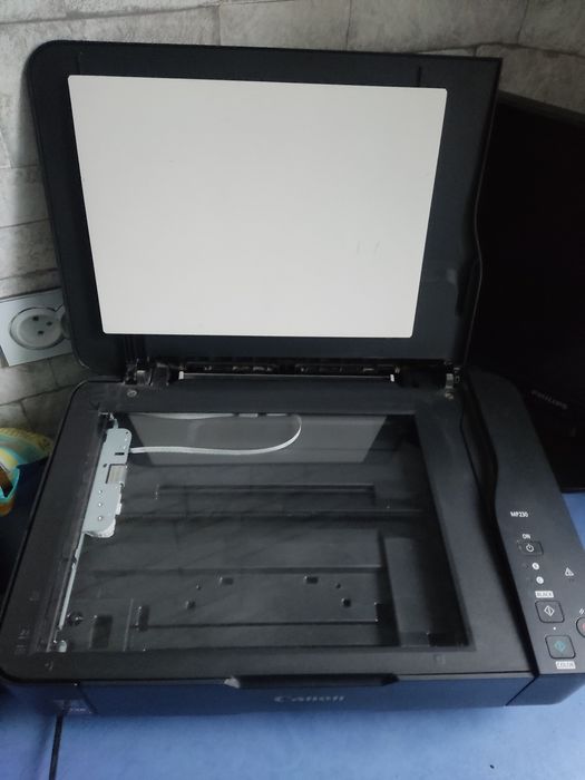 Продам сканер -принтер canon МР230мр230