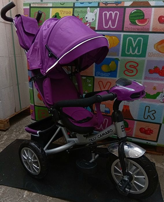 Продам детский музыкальный велосипед-коляска  Tilly Camaro почти новый.