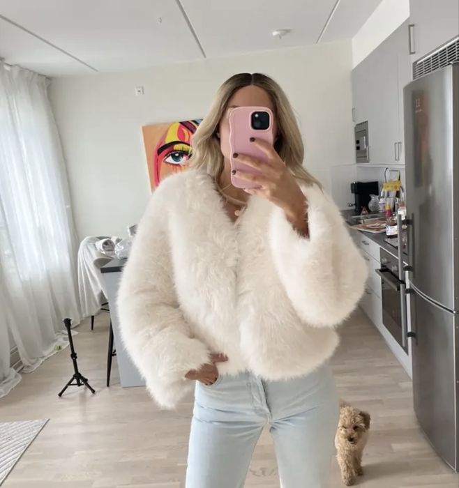 Шикарна біла шубка
