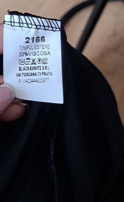 Nowy czarny kombinezon,dekolt hiszpanka,r.46