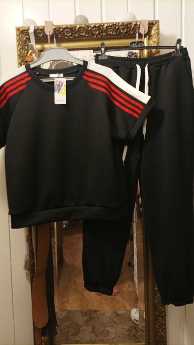 Dres damski czarny z krotkim rekawem.