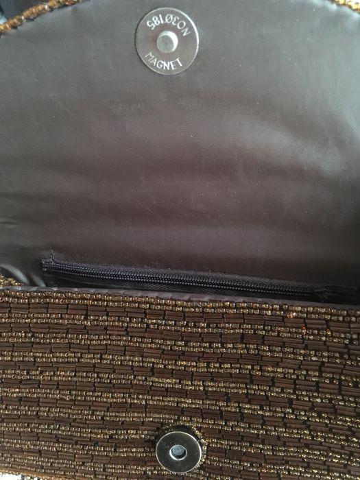 Подарунки сумки гаманці