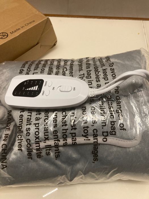 Koc grzewczy na plecy i kark