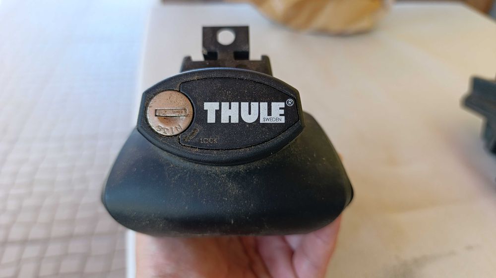 Suporte Thule para veículos com barras longitudinais