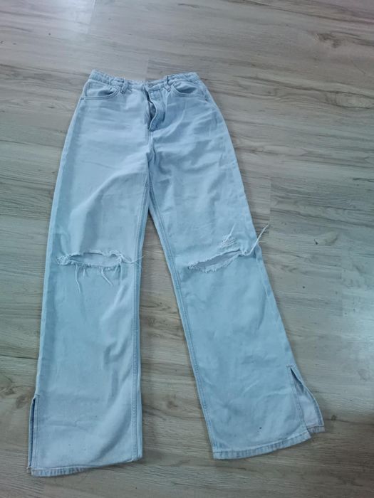 Jeansy jasno niebieskie z prostą nogawka