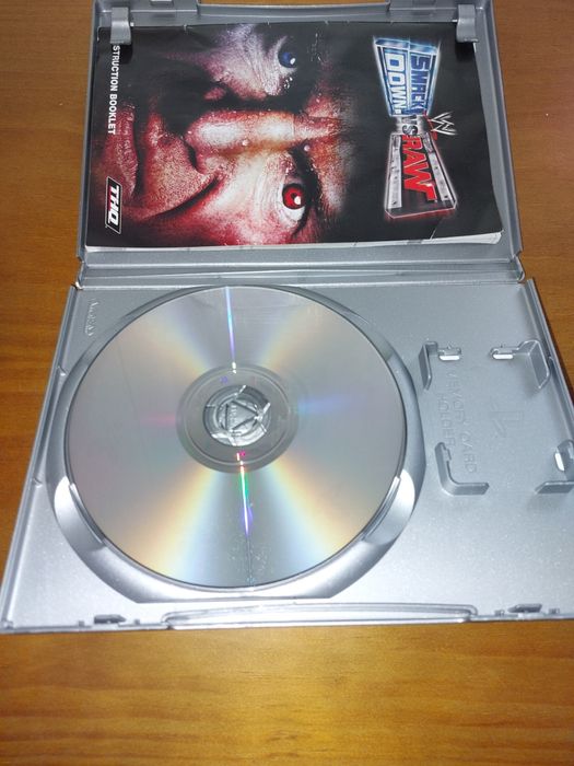Jogo PS2 ( PlayStation 2 ) Smackdown VS RAW 2004 (Opt. Estado)