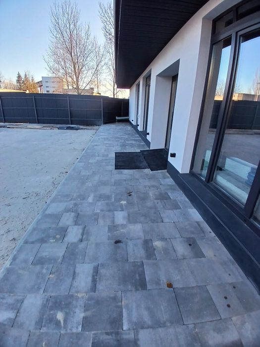 Укладня бруківки, (тротуарної плитки))