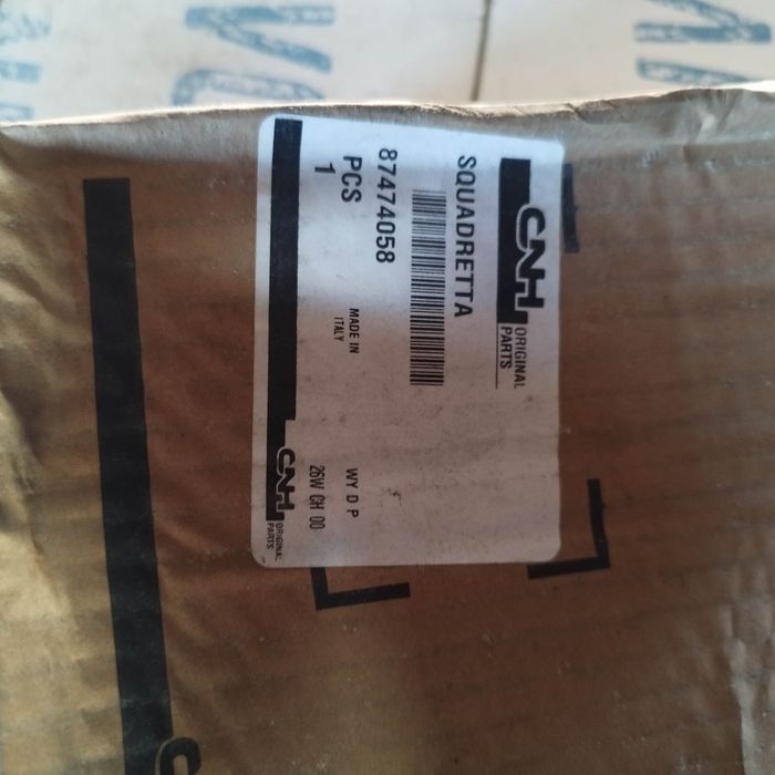 Wspornik mocowanie lampy koguta 87474058 new holland t5000