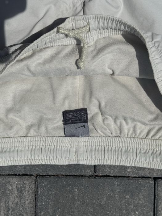 Білі штани nike