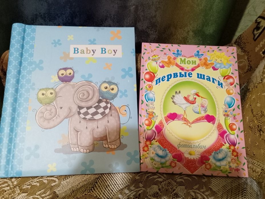 Дитячі фотоальбоми «Мої перші кроки» та «Baby Boy»