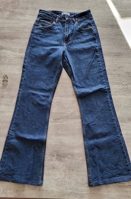 Джинси клёши тёмно - синие