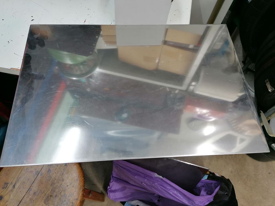 2 xapas de inox com espessura de 4 ou 5 milímetros