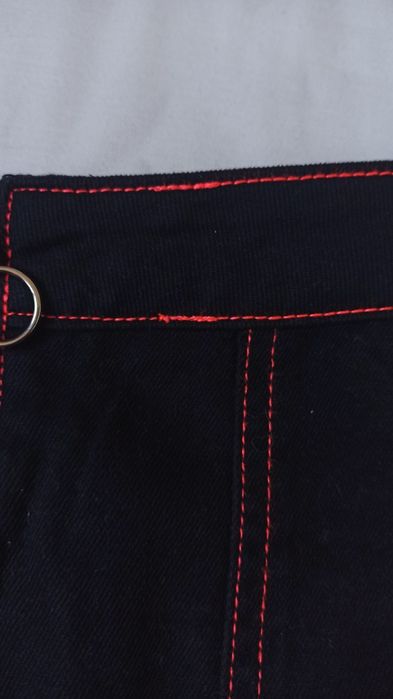 Mini saia preta com costuras neon S Denim Co