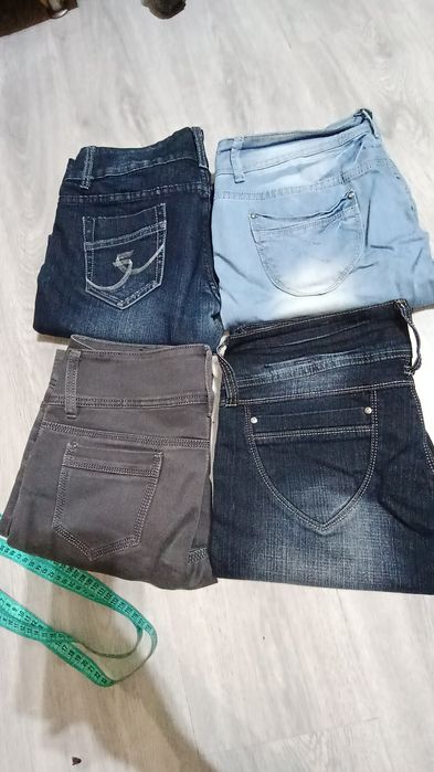 Spodnie jeansowe r.31  4 szt.