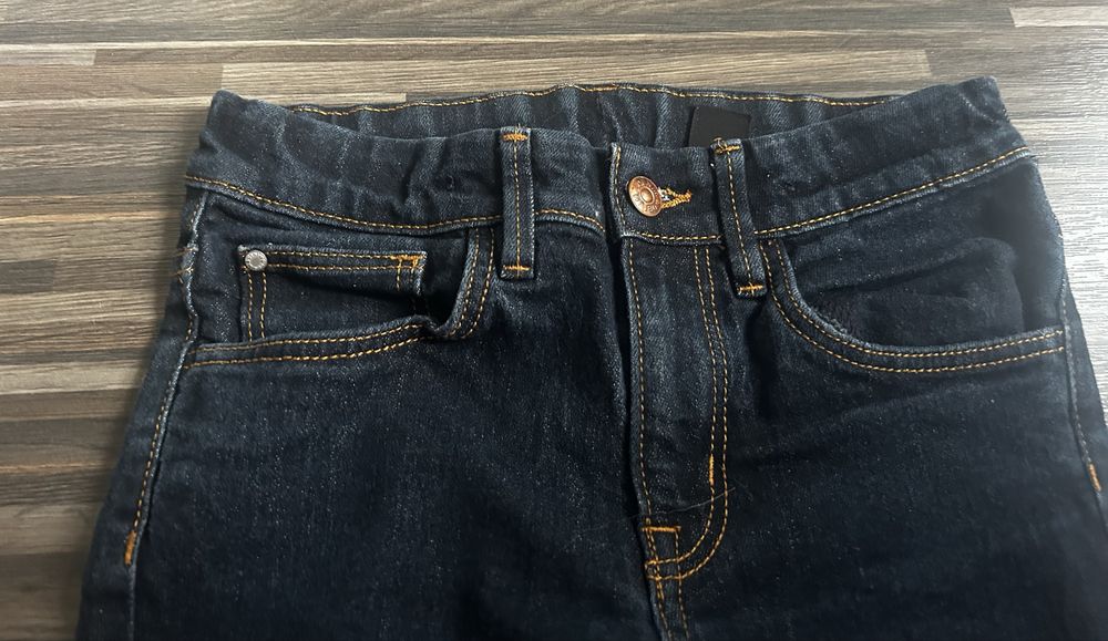 Spodnie jeansy chłopięce H&M granat rozmiar 134