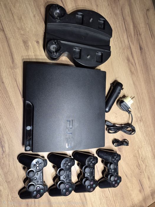 Konsola PS3 Slim + 4 pady + 14 gier + pilot + ładowarka