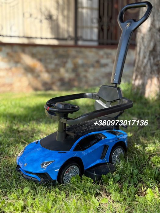 Толокар з ручкою світло музика кожане сидіння НОВИЙ