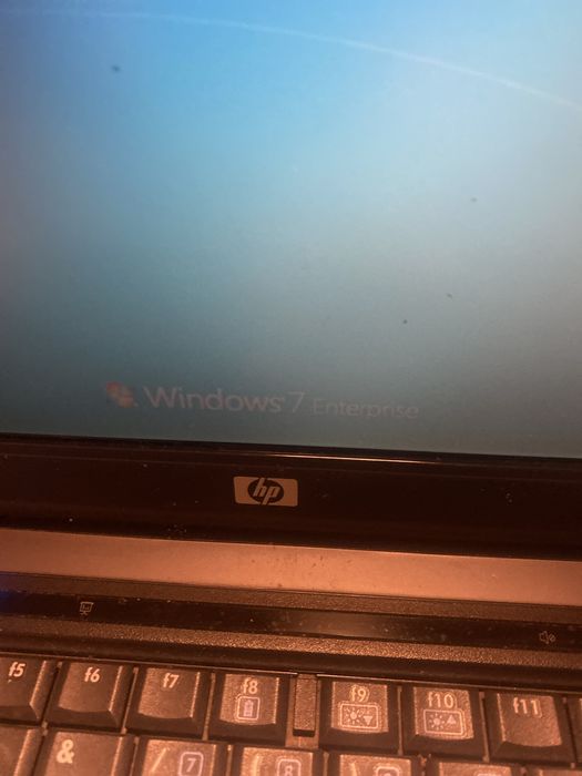 Computador antigo windos 7 tecla N desencaixada,bateria viciada