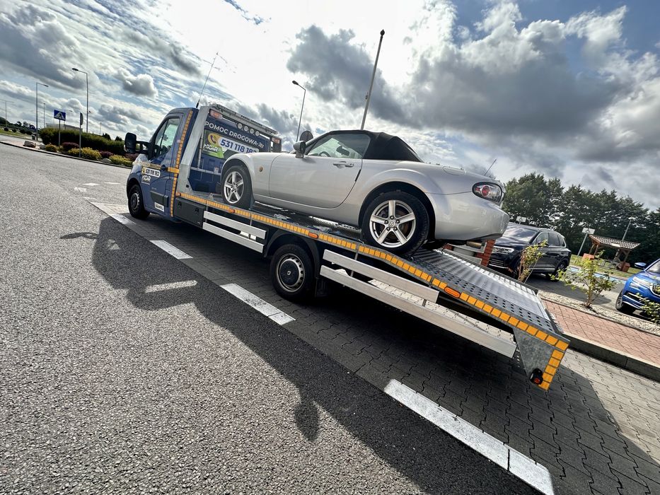 Pomoc drogowa 24/7 laweta, Warszawa, Grodzisk Maz. holowanie  fvat