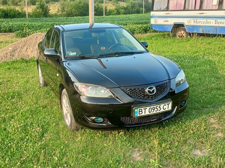 Мазда 3.2006 року