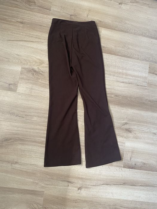 Damskie brązowe eleganckie spodnie XS dzwony