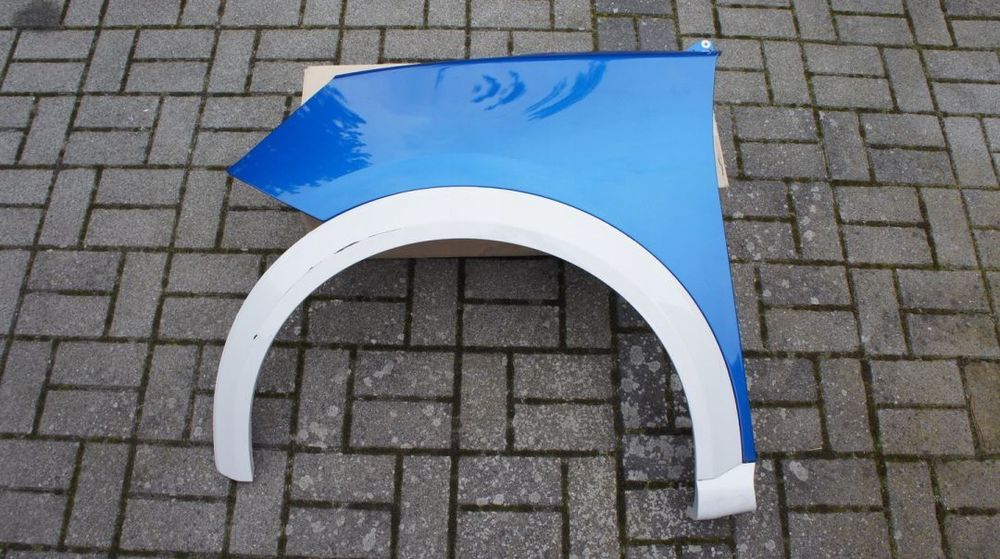 PRZEDNI LEWY BLOTNIK FORD PUMA II MK2 MKII