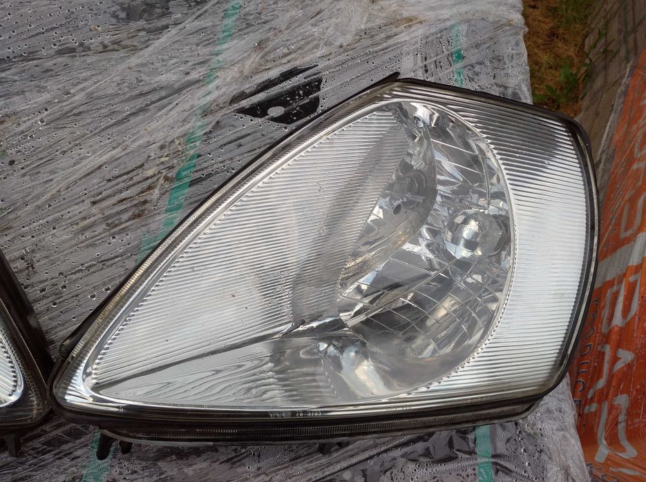 MITSUBISHI ECLIPSE 3G Lampa przednia lewa przód Lewy Oryginał