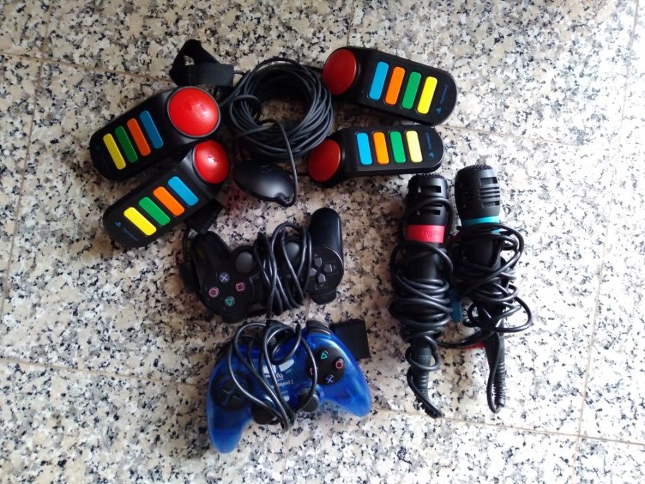 PlayStation 2 + 21 Jogos +2 comandos + 2 micros + 2 Cartões de Memoria