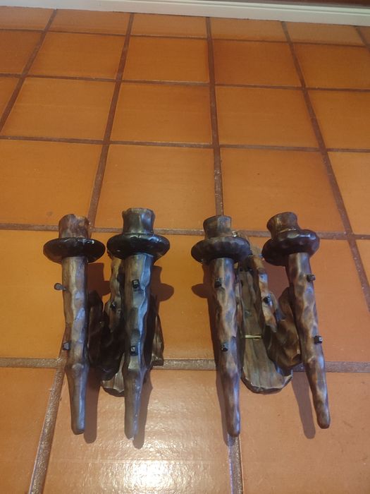 Wall-mounted candle holders
