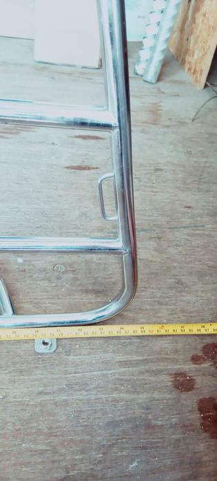 Suporte/grelha para mala