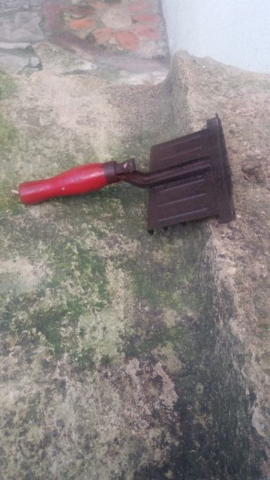 Escovador antigo para cavalos