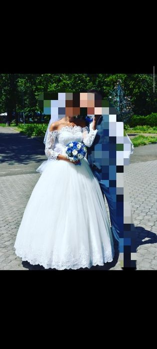 Весільня сукня ,