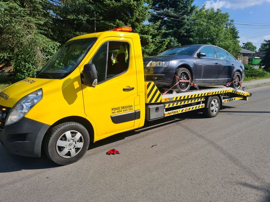 Pomoc drogowa-usługi transportowe lawetą-holowanie