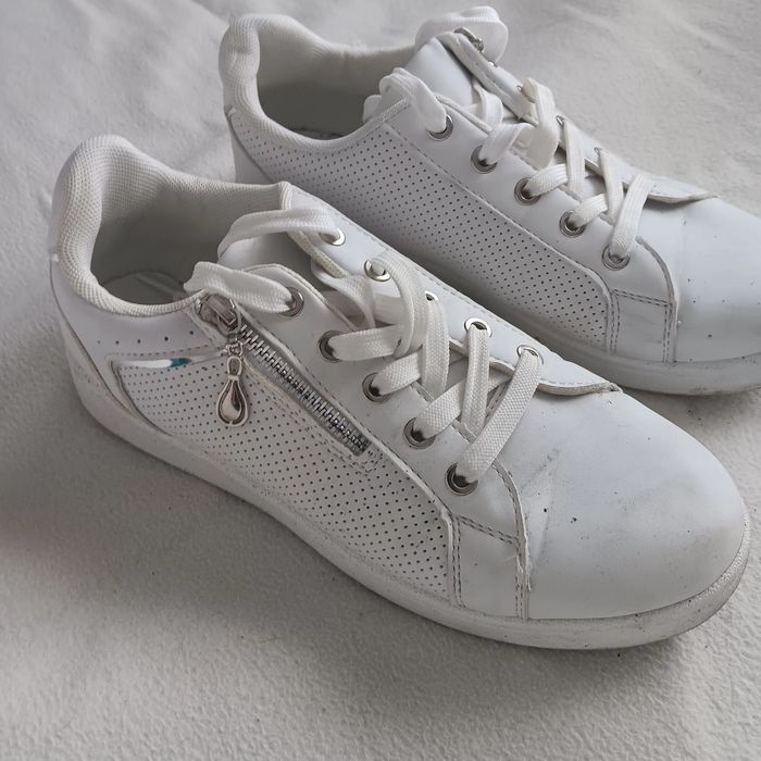 Selling white sneakers