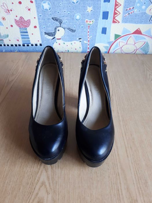 Туфли на высоком каблуке