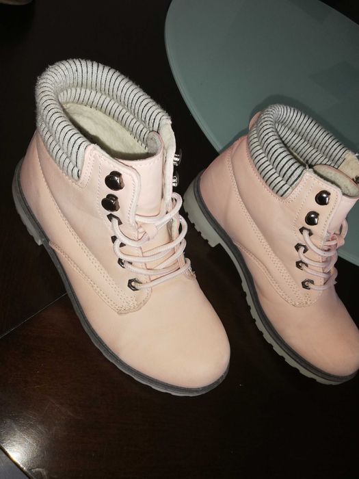 Botas cano alto de senhora