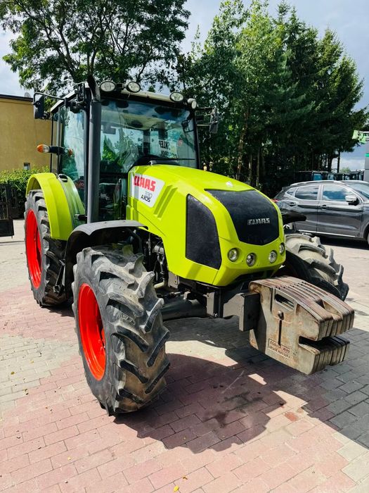 Claas Axos 330  4 cylindry PERKINS, 92 km, 2014 rok, pneumatyka, klimatyzacja
