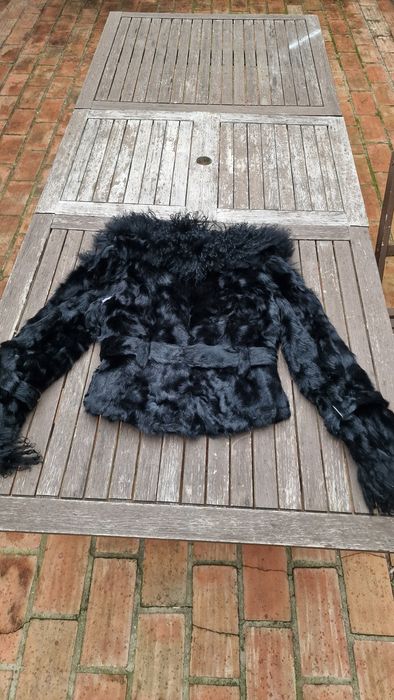 Casaco de pele verdadeira.