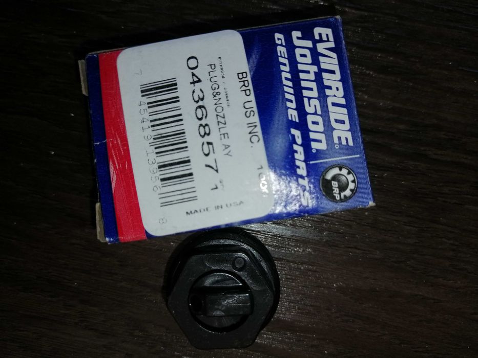 Evinrude -  plug and nozzle assembly