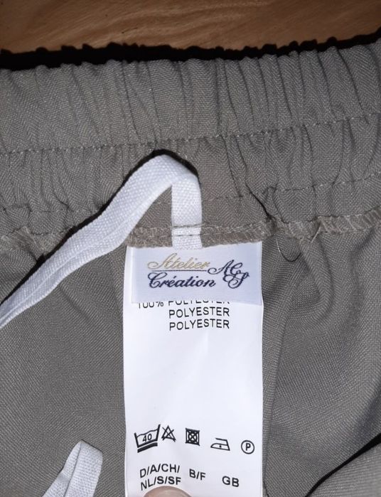 Nowe beżowe eleganckie spodnie 42 44 xl xxl materiałowe